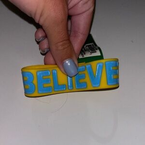 BRAND NEW BELIEVE RUBBER BRACELET